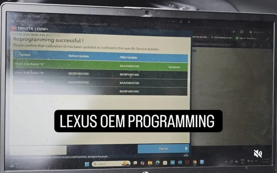 Lexus OEM module programming completion on a diagnostic laptop